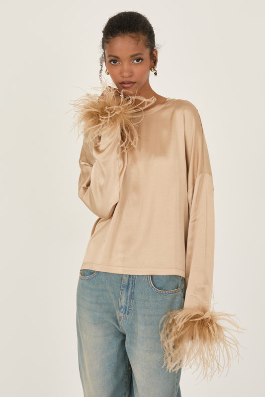 Blusa in raso con piume